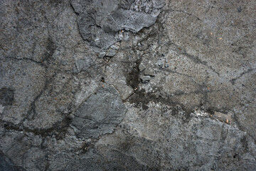 The shadow of the old gray cement wall surface with cracks    
