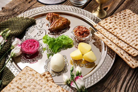 Passover Seder plate with traditional food on table