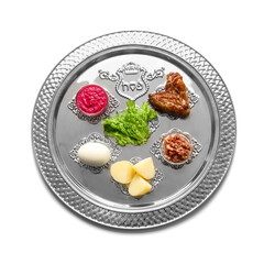 Passover Seder plate with traditional food on white background