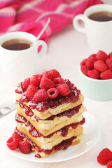 Sandwiches with peanut butter and raspberry jam