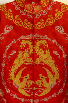 Chinese Red Wedding Dress Close Up Detail Of Gold Stitching And Details