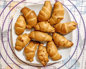 Homemade pastry. Croissants in the cooking process