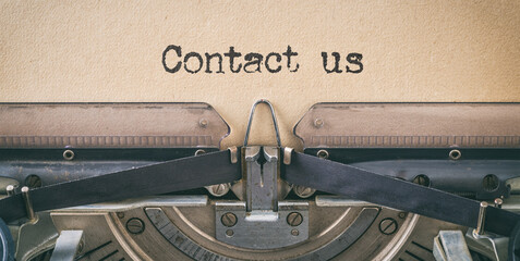 Text written with a vintage typewriter - Contact us