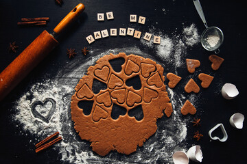 Preparing to cook homemade gingerbread for valentine's day. View from above. Gingerbread in the form of a heart.