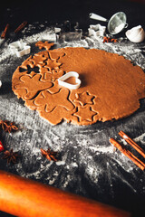 Preparing to cook homemade gingerbread for valentine's day. View from above. Gingerbread in the form of a heart.