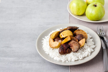 Fried chicken liver with apples and onions