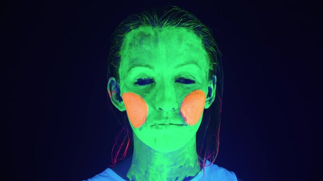 Video of frighten woman with scary painted face