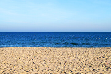 empty sandy beach, sea and clear sky, landscape for background