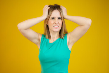 Fototapeta premium Young caucasian woman over isolated background doing nervous gesture