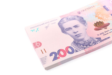 200 Ukrainian Hryvnia banknotes on white background