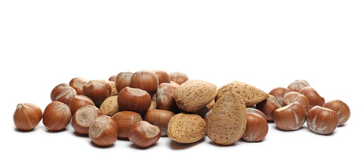 Hazelnuts and almonds, nuts pile isolated on white background