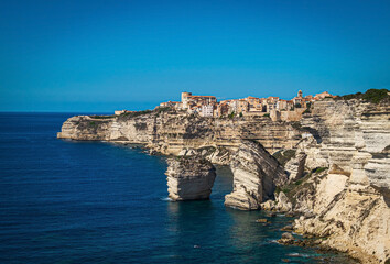 Fototapeta na wymiar City of Bonifacio, Corse, France,partly located ontop of a rock of lime-stone