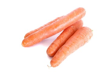 Fresh organic carrots on white background.