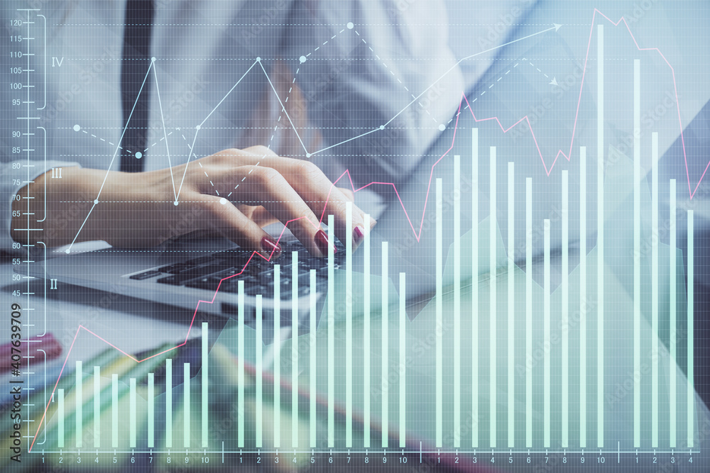 Wall mural double exposure of woman hands typing on computer and financial graph hologram drawing. stock market