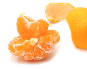 Slices of tangerine isolated on a white background.