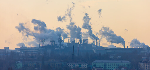 Fototapeta premium Smoke from chimneys of a metallurgical plant. Technologies
