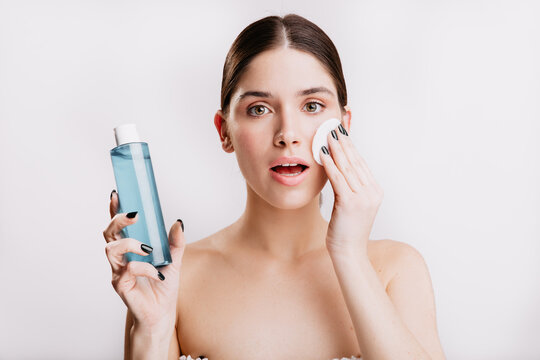 Snapshot Of Pretty Girl Without Make-up, Cleansing Face Of Impurities Using Micellar Water