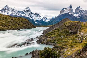 Part of the Salto Grande waterfall cascade of river Paine in Torres del Paine National Park (CL). In the background are Cuernos del Paine or "Paine horns"