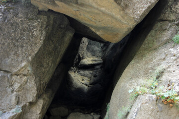 Obraz premium Passage between the rocks high in the mountains.