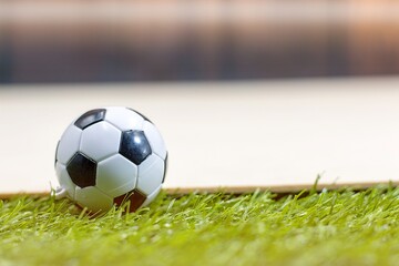 Soccer ball is on dark background