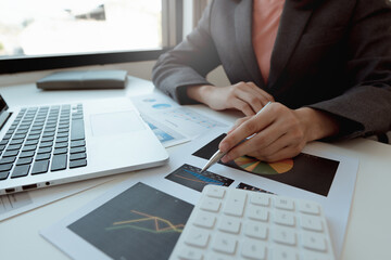 Business people checking charts, spreadsheets, graphs, financial development, bank accounts, economic statistics, data analysis, investment analysis, stock market