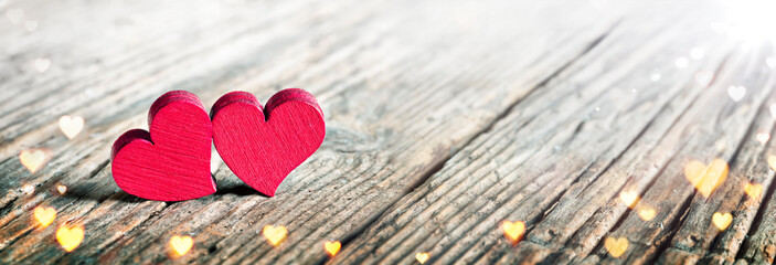 Hearts On Wooden Background - Symbol Of Love