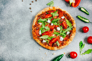 .top view of pizza on gray background