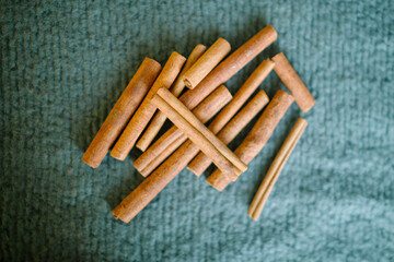 cinnamon sticks on wool background