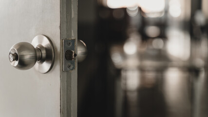 Close-up shot of a dirty doorknob. The doorknob is being found that caused the COVID-19 infection.