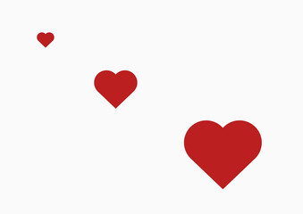 three red hearts of different sizes on a white background