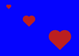 three red hearts of different sizes on a blue background