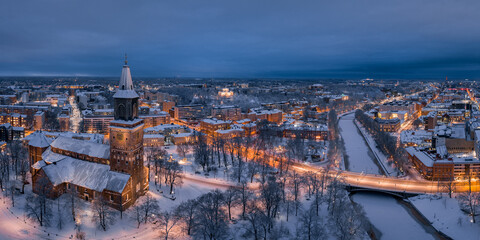 Panorama aerial view of the city skyline at winter night in Turku, Finland