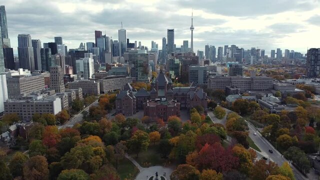 Wide Aerial of Queen's Park and Toronto skyline revealing large city building developments