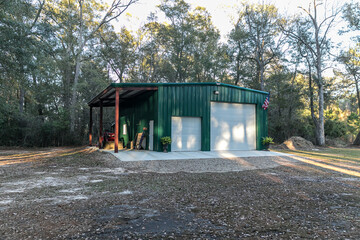 Large green outdoor metal building