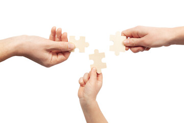 Hands hold puzzles. Adoption of a child into a family. Solution of problems.