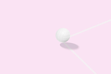 White volleyball ball flying in the air. Sport theme background with copy space for text and advertisment.