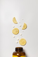 Tablets and lemon from a jar