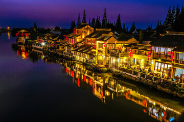 Fototapeta na wymiar Weekend getaway from bustling city of Shanghai to an ancient water town of Zhujiajiao to see one of the ancient water town in China, where people call Venice of the East