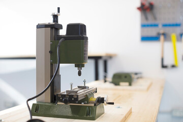 Industrial wood machine in carpenter workshop