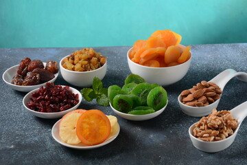 Mix of dried and sun-dried fruits, and nuts. Kiwi, apricot. Symbols of the Jewish holiday of Tu BiShvat