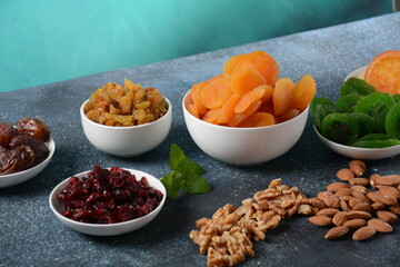 Mix of dried and sun-dried fruits, and nuts. Kiwi, apricot. Symbols of the Jewish holiday of Tu BiShvat
