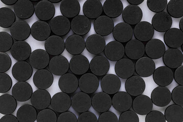 activated carbon on a white acrylic background