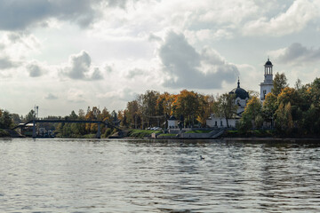 View from the water to the Church of the Holy Blessed Grand Duke Alexander Nevsky in Ust-Izhora in autumn. Boat trip. Russia, St. Petersburg, September 30, 2020.