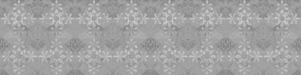 Old aged gray grey white vintage worn shabby elegant floral leaves flower patchwork motif tile stone concrete cement wall ager wallpaper seamless pattern texture background banner panorama