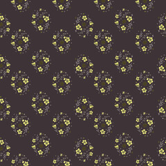 Fototapeta na wymiar Retro ditsy seamless pattern with flowers and leaves print in autumn tones. Brown background.
