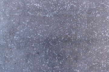 Blue-gray galvanized metal texture with speckles. close-up. Textured background. industrial sheets for building needs