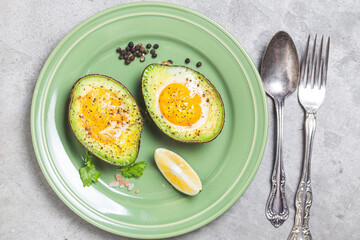 homemade organic egg baked avocado with salt pepper (1)
