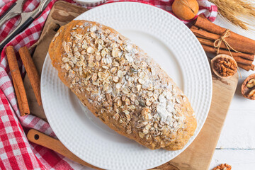 top view sliced wholegrain bread wooden cutting board