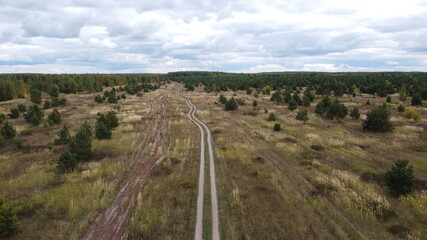 Fototapeta na wymiar road and forest view from the copter