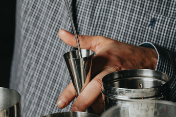 Ice in a glass of wine prepared for a special cocktail for a bartender's bar or restaurant.